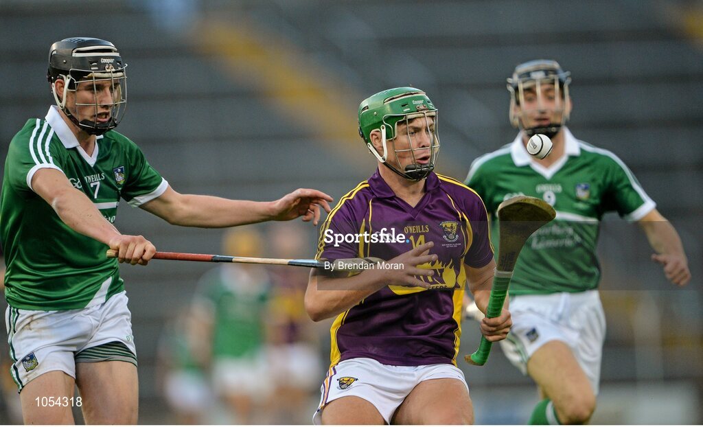 12 September 2015; Conor McDonald, Wexford, controls the sliotar ahead of Gearóid Hegarty, Limerick. Bord Gais Energy GAA Hurling All-Ireland U21 Championship Final, Limerick v Wexford, Semple Stadium, Thurles, Co. Tipperary. Picture credit: Brendan Moran / SPORTSFILE