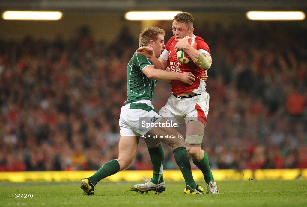 21 March 2009; Dafydd Jones, Wales, is tackled by Luke Fitzgerald, Ireland. RBS Six Nations Championship, Wales v Ireland, Millennium Stadium, Cardiff, Wales. Picture credit: Stephen McCarthy / SPORTSFILE