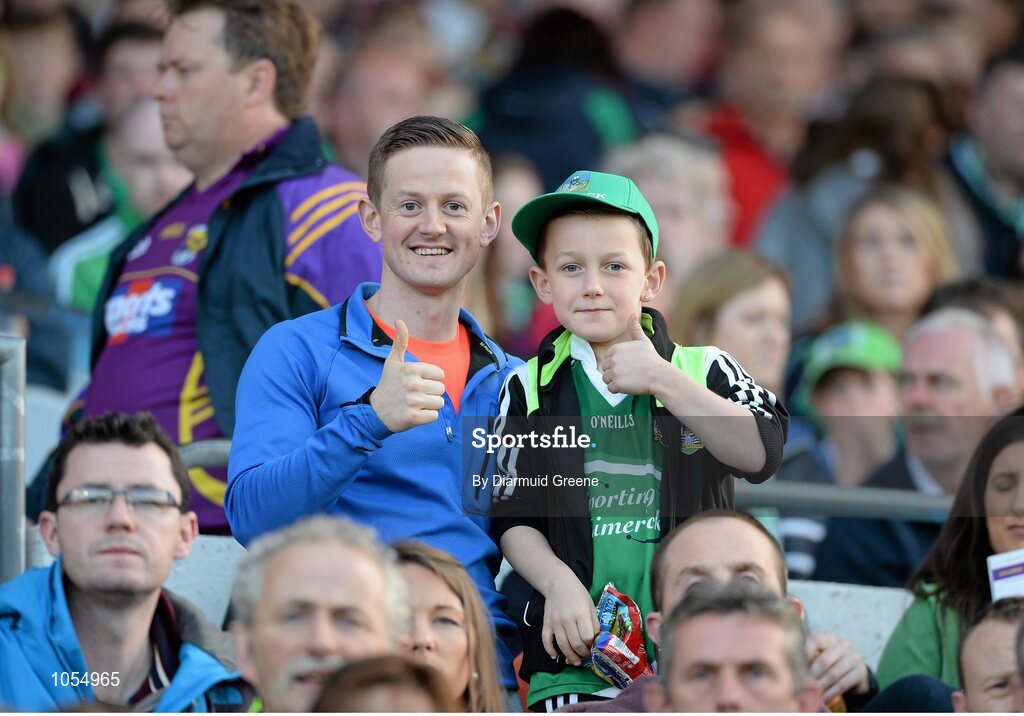 12 September 2015; Limerick supporters Scott Ryan Coleman, aged 9, along with his father Gavin Coleman, from Pallasgreen, Co. Limerick, before the game. Bord Gais Energy GAA Hurling All-Ireland U21 Championship Final, Limerick v Wexford, Semple Stadium, Thurles, Co. Tipperary. Picture credit: Diarmuid Greene / SPORTSFILE
