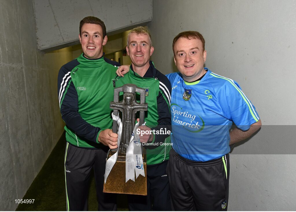 12 September 2015; Limerick manager John Kiely, centre, along with members of his backroom team, Kieran Hickey, left, and Conor Reale, right, celebrate with the Cross of Cashel trophy after victory over Wexford. Bord Gais Energy GAA Hurling All-Ireland U21 Championship Final, Limerick v Wexford, Semple Stadium, Thurles, Co. Tipperary. Picture credit: Diarmuid Greene / SPORTSFILE