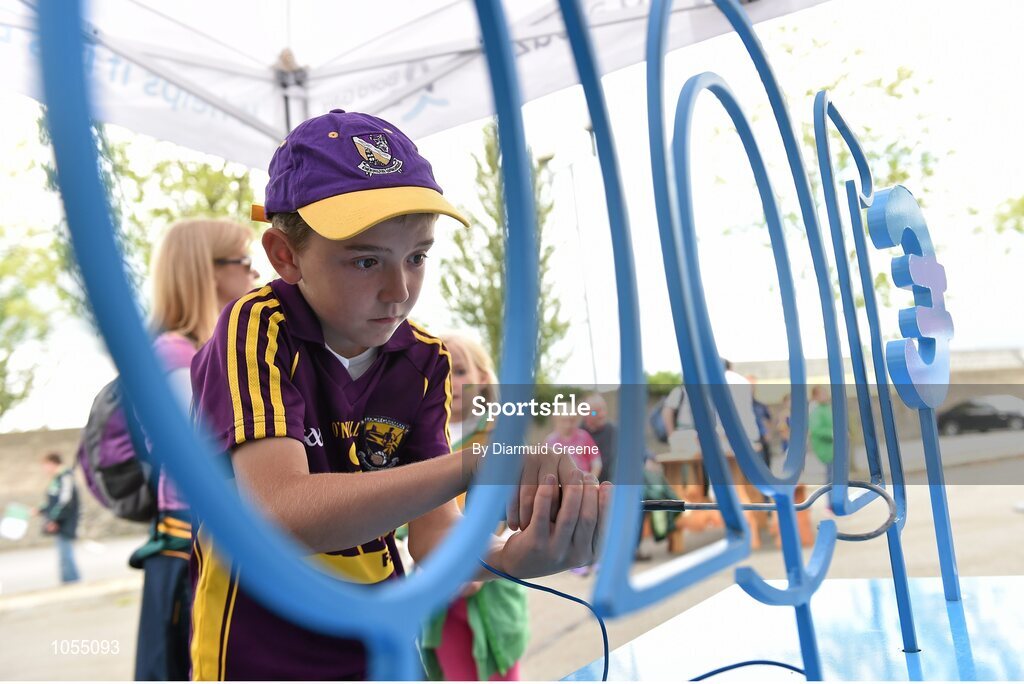 12 September 2015; Joshua Power, from St Abban's GAA club, Adamstown, Co. Wexford, tries his hand at the buzzer game in the Bord Gais Energy fanzone before the game. Bord Gais Energy GAA Hurling All-Ireland U21 Championship Final, Limerick v Wexford, Semple Stadium, Thurles, Co. Tipperary. Picture credit: Diarmuid Greene / SPORTSFILE
