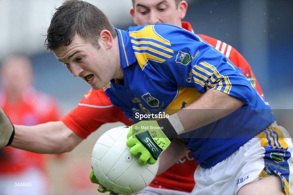29 March 2009; Barry Grogan, Tipperary, in action against Dessie Finnegan, Louth. Allianz GAA NFL Division 3, Round 6, Tipperary v Louth, Semple Stadium, Thurles, Co. Tipperary. Picture credit: Matt Browne / SPORTSFILE