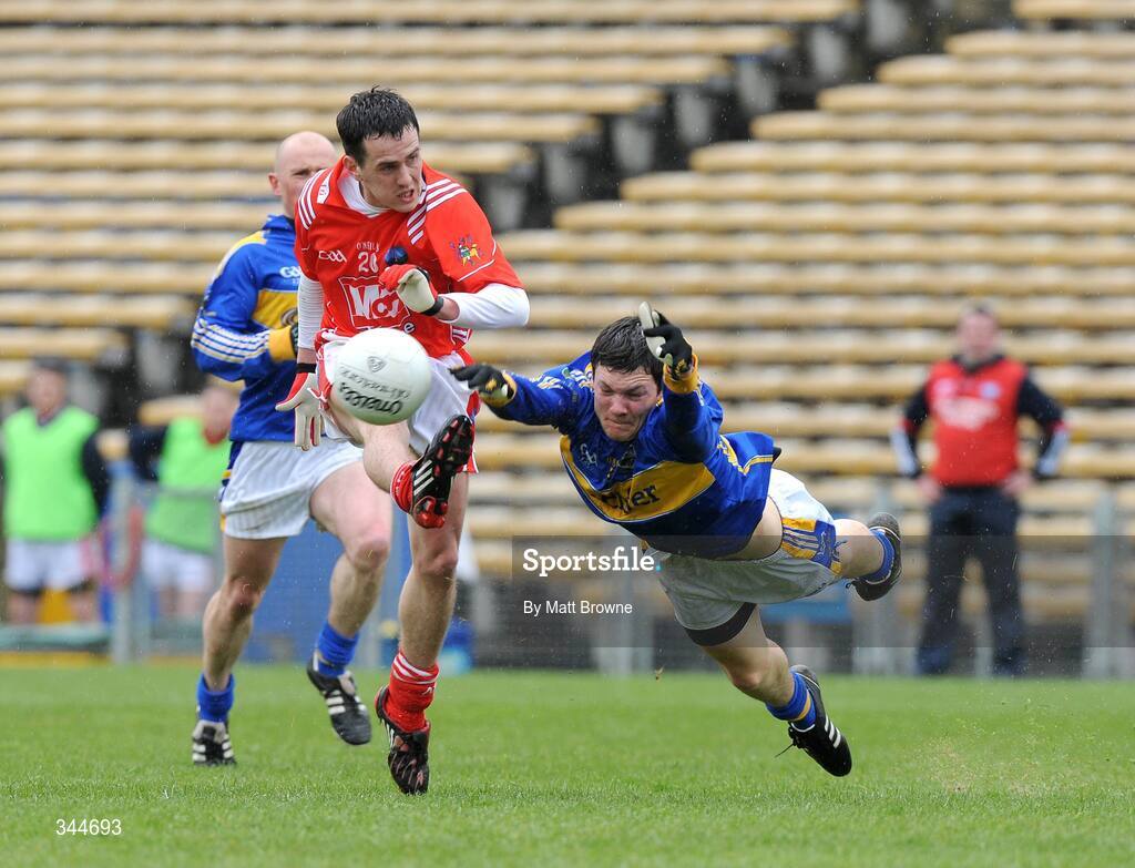 29 March 2009; David Reid, Louth, in action against Ciaran McDonald, Tipperary. Allianz GAA NFL Division 3, Round 6, Tipperary v Louth, Semple Stadium, Thurles, Co. Tipperary. Picture credit: Matt Browne / SPORTSFILE