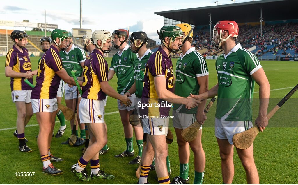 12 September 2015; Wexford's James Cash exchanges a handshake with Limerick's Barry Nash during the respect handshake before the game. Bord Gais Energy GAA Hurling All-Ireland U21 Championship Final, Limerick v Wexford, Semple Stadium, Thurles, Co. Tipperary. Picture credit: Diarmuid Greene / SPORTSFILE