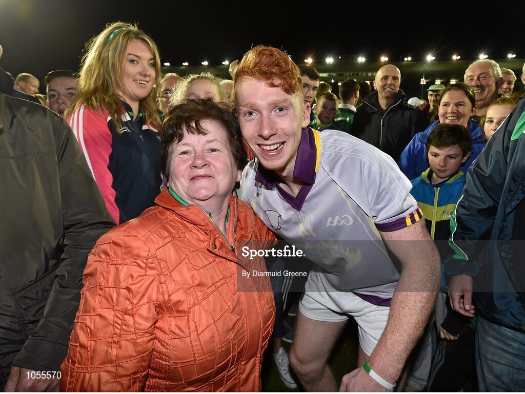 12 September 2015; Limerick's Cian Lynch is congratulated by supporters on the pitch after the game. Bord Gais Energy GAA Hurling All-Ireland U21 Championship Final, Limerick v Wexford, Semple Stadium, Thurles, Co. Tipperary. Picture credit: Diarmuid Greene / SPORTSFILE