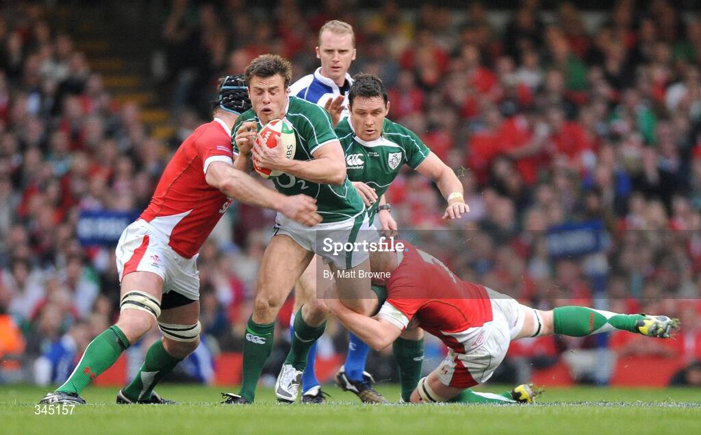 21 March 2009; Tommy Bowe, Ireland, is tackled by Ian Gough and Martyn Williams, Wales. RBS Six Nations Championship, Wales v Ireland, Millennium Stadium, Cardiff, Wales. Picture credit: Matt Browne / SPORTSFILE