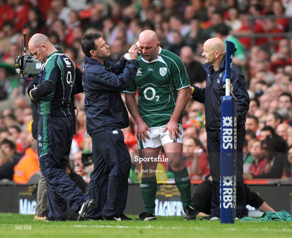 21 March 2009; Ireland's John Hayes has a blood injury attended to by team doctor Dr. Michael Webb. RBS Six Nations Championship, Wales v Ireland, Millennium Stadium, Cardiff, Wales. Picture credit: Matt Browne / SPORTSFILE