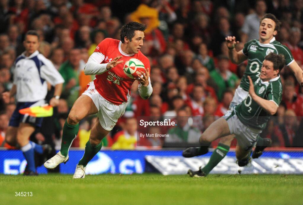 21 March 2009; Gavin Henson, Wales, gets away from Ronan O'Gara, Ireland. RBS Six Nations Championship, Wales v Ireland, Millennium Stadium, Cardiff, Wales. Picture credit: Matt Browne / SPORTSFILE