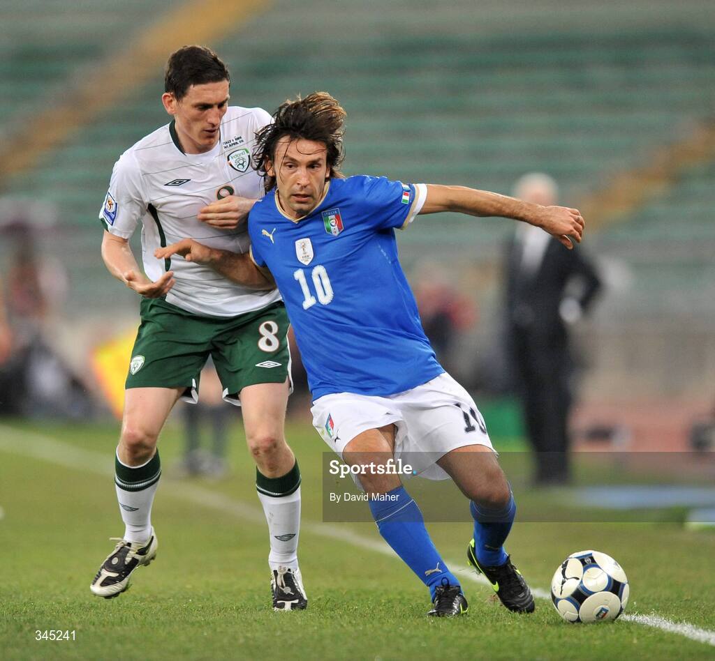 1 April 2009; Andrea Pirlo, Italy, in action against Keith Andrews, Republic of Ireland. 2010 FIFA World Cup Qualifier, Italy v Republic of Ireland, San Nicola Stadium, Bari, Italy. Picture credit: David Maher / SPORTSFILE