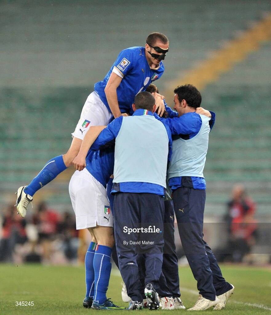 1 April 2009; Vincenzo Iaquinta, Italy, hidden, celebrates with team-mates including Giorgio Chiellini, top, after scoring his side's first goal. 2010 FIFA World Cup Qualifier, Italy v Republic of Ireland, San Nicola Stadium, Bari, Italy. Picture credit: David Maher / SPORTSFILE