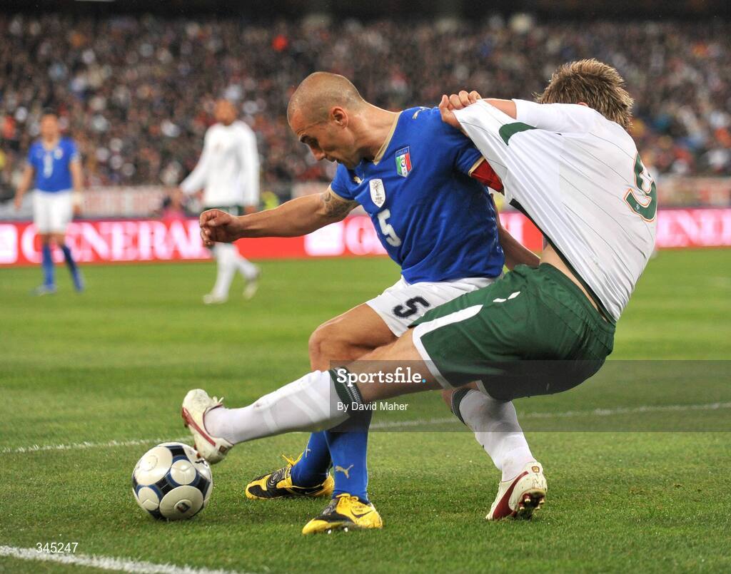 1 April 2009; Kevin Doyle, Republic of Ireland, in action against Fabio Cannanaro, Italy. 2010 FIFA World Cup Qualifier, Italy v Republic of Ireland, San Nicola Stadium, Bari, Italy. Picture credit: David Maher / SPORTSFILE