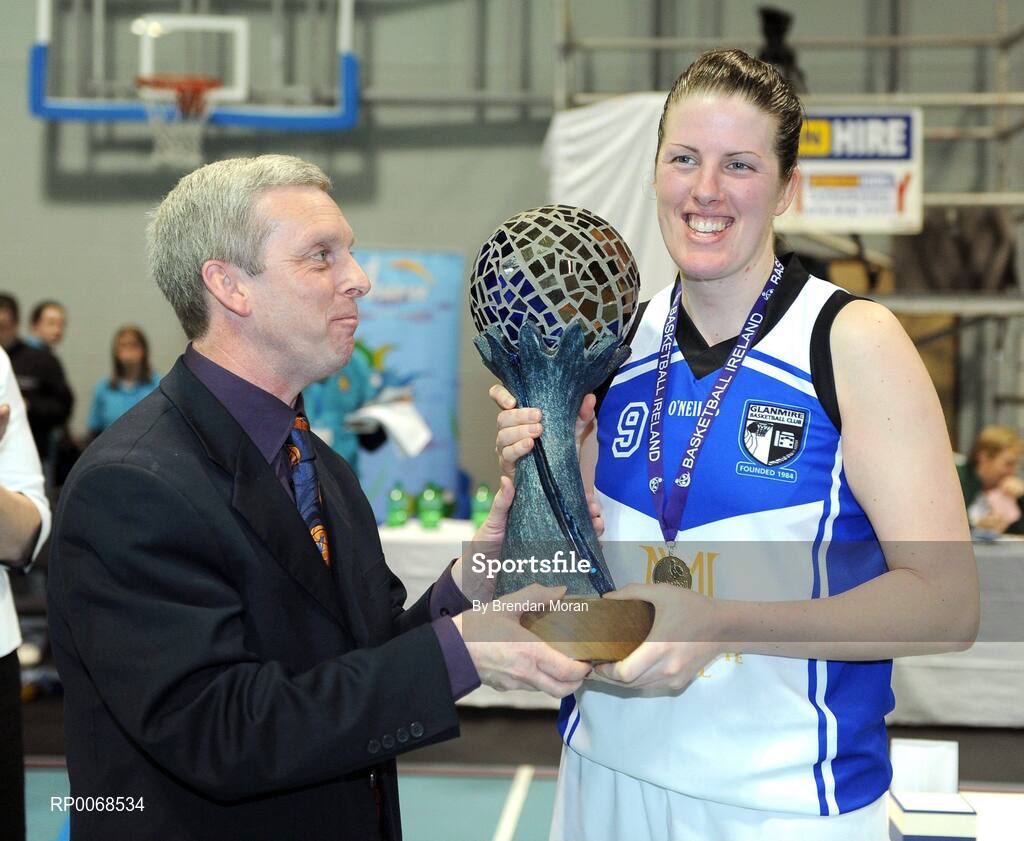 28 March 2009; Michelle Fahy, captain, Team Montenotte Hotel, Cork, is presented with the Women's Superleague trophy by Timmy Murphy, Competitions Chairman, Basketball Ireland. Basketball Ireland’s Women’s Superleague Final, DCU Mercy v Team Montenotte Hotel Cork, Aura Complex, Letterkenny, Co. Donegal. Picture credit: Brendan Moran / SPORTSFILE