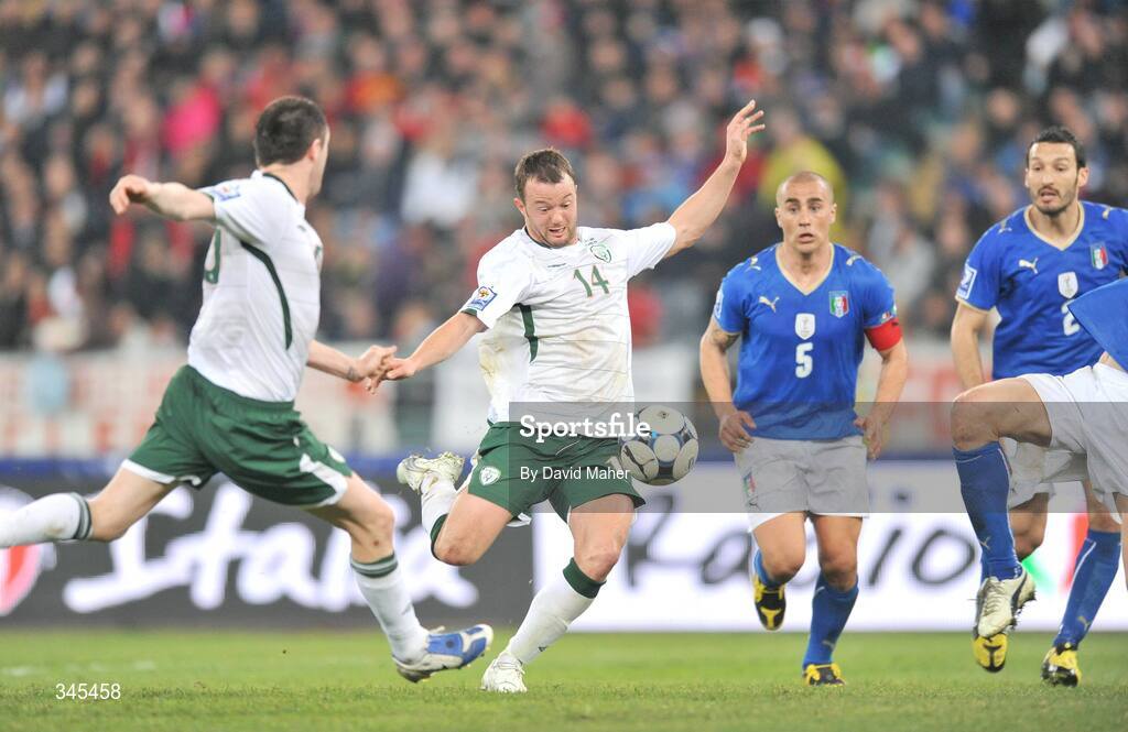 1 April 2009; Republic of Ireland's Robbie Keane, left, and Noel Hunt contest a loose ball in advance of scoring of Ireland's first goal. 2010 FIFA World Cup Qualifier, Italy v Republic of Ireland, San Nicola Stadium, Bari, Italy. Picture credit: David Maher / SPORTSFILE
