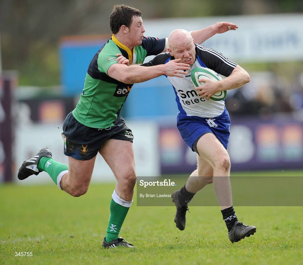 5 April 2009; Cronan Healy, Cork Constitution, in action against Willie Faloon, Ballinahinch. AIB Cup Final, Cork Constitution v Ballinahinch, Dubarry Park, Athlone, Co. Westmeath. Picture credit: Brian Lawless / SPORTSFILE