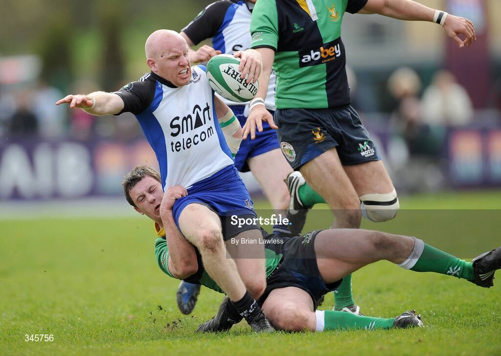 5 April 2009; Cronan Healy, Cork Constitution, in action against Willie Faloon, Ballinahinch. AIB Cup Final, Cork Constitution v Ballinahinch, Dubarry Park, Athlone, Co. Westmeath. Picture credit: Brian Lawless / SPORTSFILE