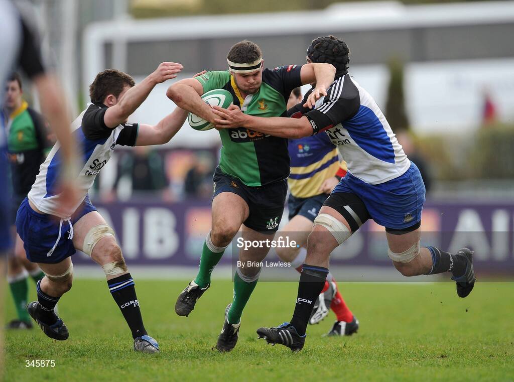 5 April 2009; Neil Hanna, Ballinahinch, in action against Peter O'Mahony, left, and Billy Holland, Cork Constitution. AIB Cup Final, Cork Constitution v Ballinahinch, Dubarry Park, Athlone, Co. Westmeath. Picture credit: Brian Lawless / SPORTSFILE