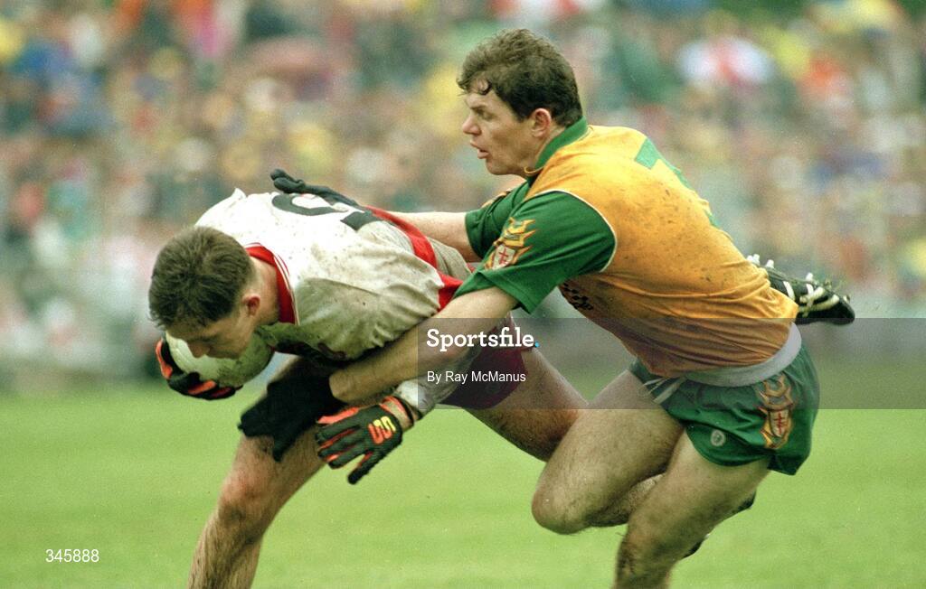 18 July 1993; Damien Cassidy of Derry in action against Matt Gallagher of Donegal during the Ulster Senior Football Championship Final match between Derry and Donegal at St. Tighearnach's Park, Clones, Monaghan. Photo by Ray McManus/Sportsfile
