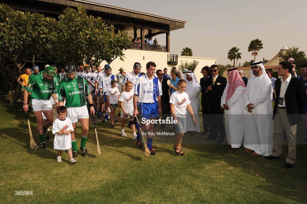 14 March 2009; Leinster captain J.J. Delaney and Connacht captain Andy Coen leads their side's out ahead of the game. M Donnelly Interprovincial Hurling Final presented by Etihad Airways, Leinster v Connacht, Ghantoot Racing and Polo Club, Abu Dhabi, United Arab Emirates. Picture credit: Ray McManus / SPORTSFILE