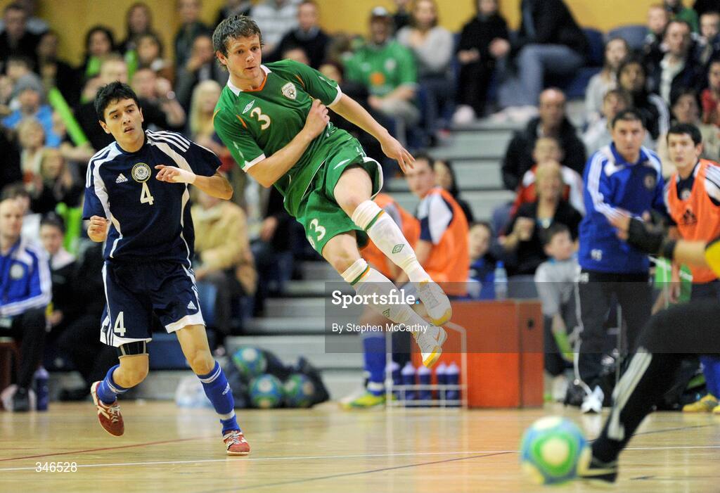 22 February 2009; Dane Massey, Republic of Ireland, gets his shot in goal despite the attention of Dauren Nurgozhin, Kazakhstan. UEFA Futsal Championship 2010 Qualifying Tournament, Republic of Ireland v Kazakhstan. National Basketball Arena, Tallaght. Picture credit: Stephen McCarthy / SPORTSFILE