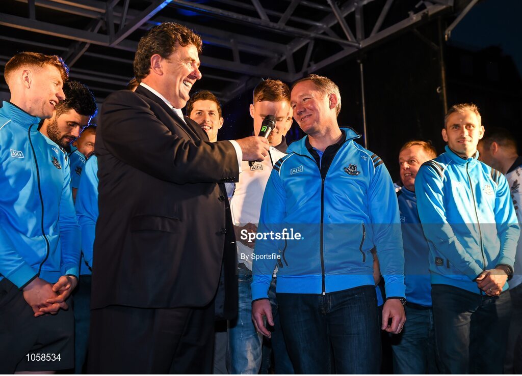 21 September 2015; Dublin manager Jim Gavin, centre right, speaking with Des Cahill during the team homecoming. O'Connell St, Dublin. Photo by Sportsfile