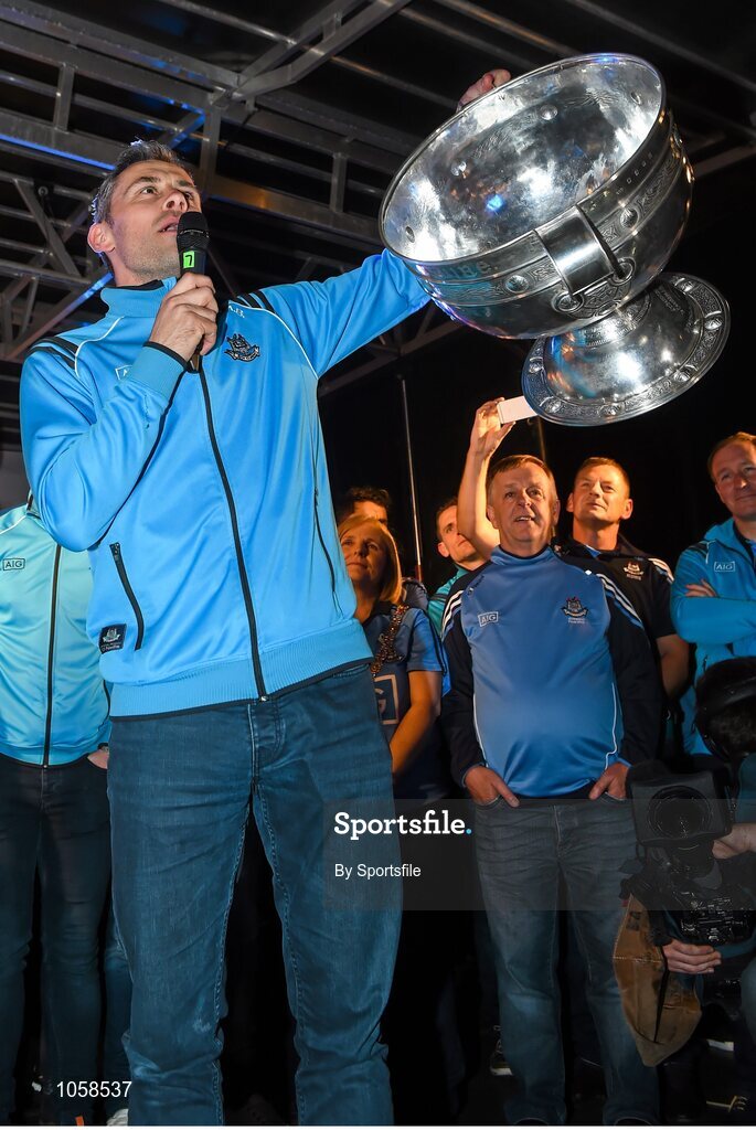 21 September 2015; Dublin's Alan Brogan celebrates on stage with the Sam Maguire cup during the team homecoming. O'Connell St, Dublin. Photo by Sportsfile