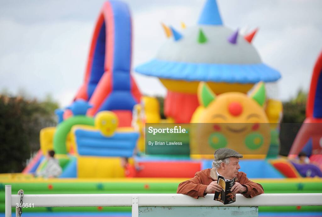 12 April 2009; A race fan awaits the start of the Irish Stallion Farms European Breeders Fund Mares Novice Hurdle Championship Final. Fairyhouse, Co. Meath. Picture credit: Brian Lawless / SPORTSFILE *** Local Caption ***