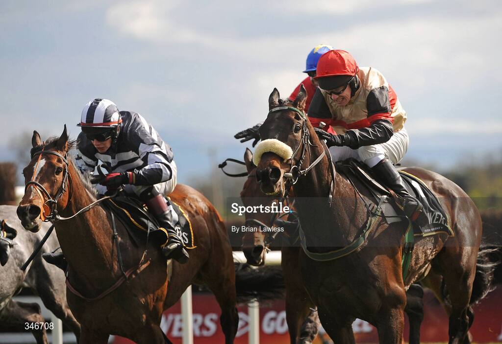 12 April 2009; Aran Concerto, with Paul Carberry up, right, races clear of eventual third Deutschland, with Paul Townend up, on the way to winning the Powers Gold Cup. Fairyhouse, Co. Meath. Picture credit: Brian Lawless / SPORTSFILE *** Local Caption ***