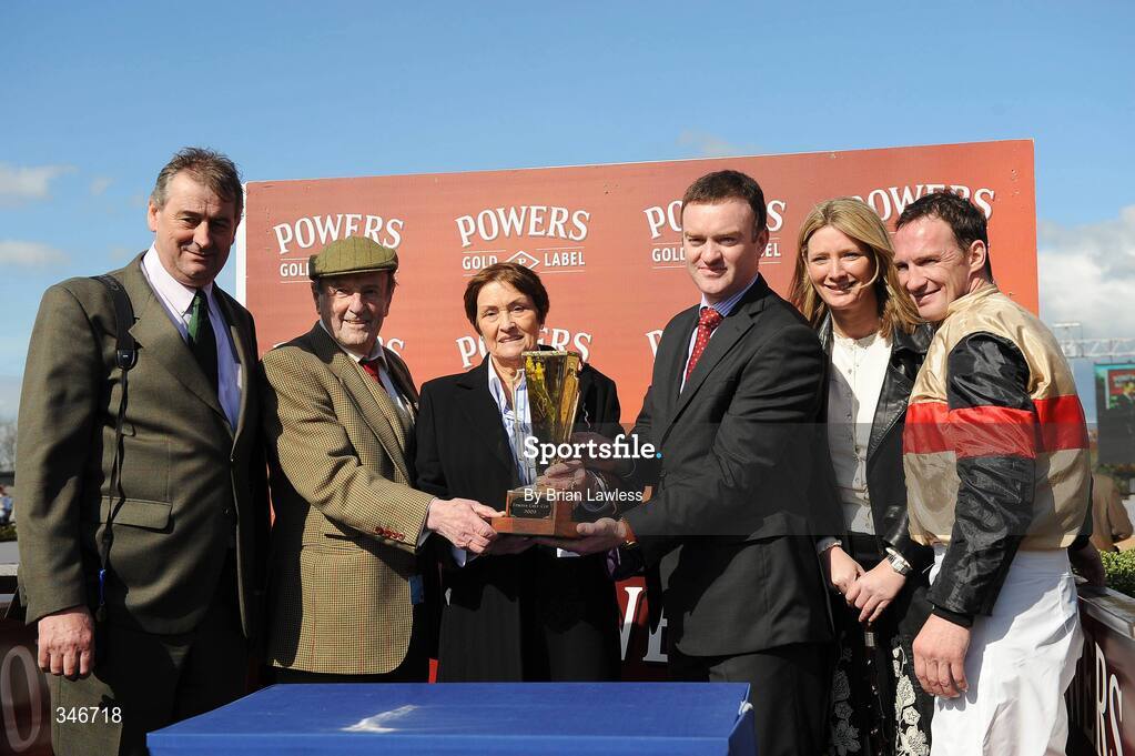 12 April 2009; Jockey Paul Carberry and trainer Noel Meade, left, with winning connections of Aran Concerto after winning the Powers Gold Cup. Fairyhouse, Co. Meath. Picture credit: Brian Lawless / SPORTSFILE *** Local Caption ***