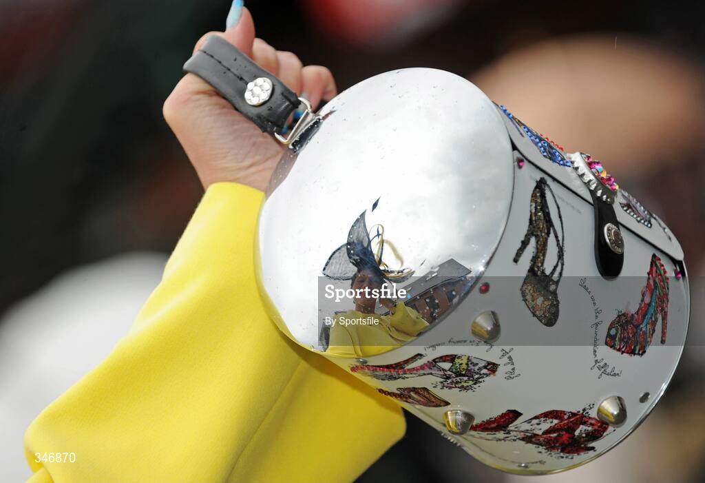 13 April 2009; Olivia Jones from Enniskillen, Co. Fermanagh is reflected in her handbag during the days racing at Fairyhouse. Fairyhouse Racecourse, Co. Meath. Photo by Sportsfile