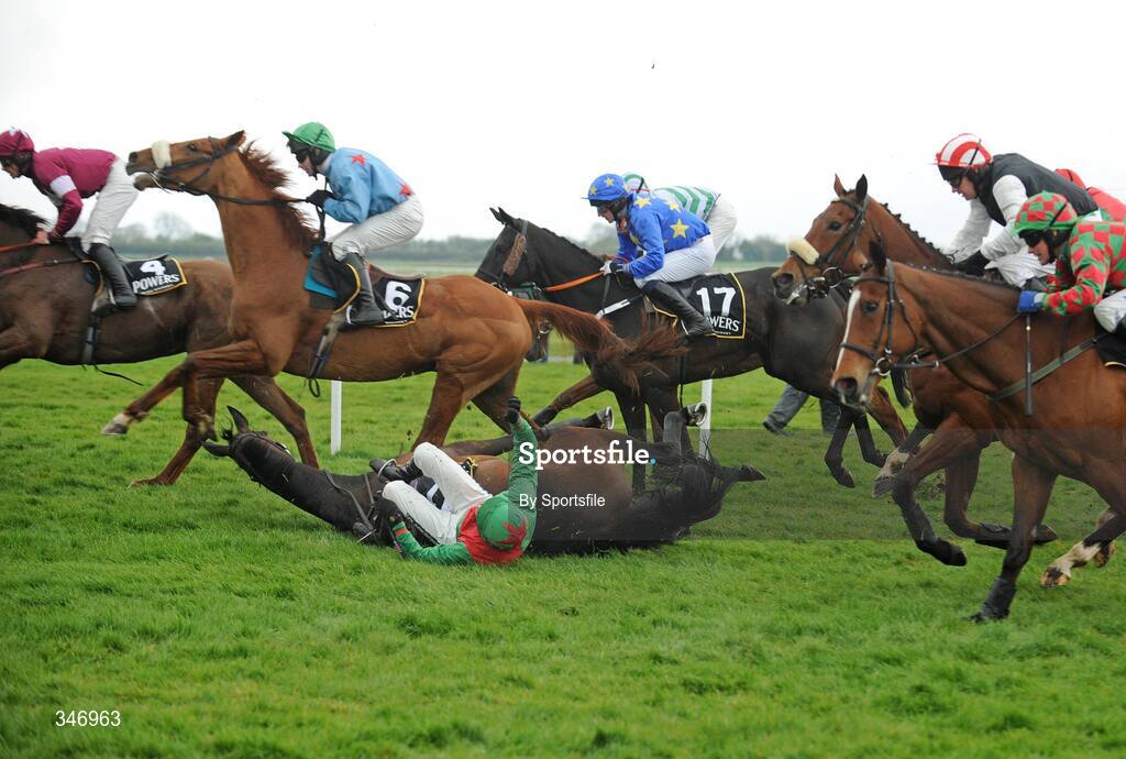 13 April 2009; Barry Geraghty after falling from his horse Drumconvis during the Powers Whiskey Irish Grand National Steeplechase. Fairyhouse Racecourse, Co. Meath. Photo by Sportsfile
