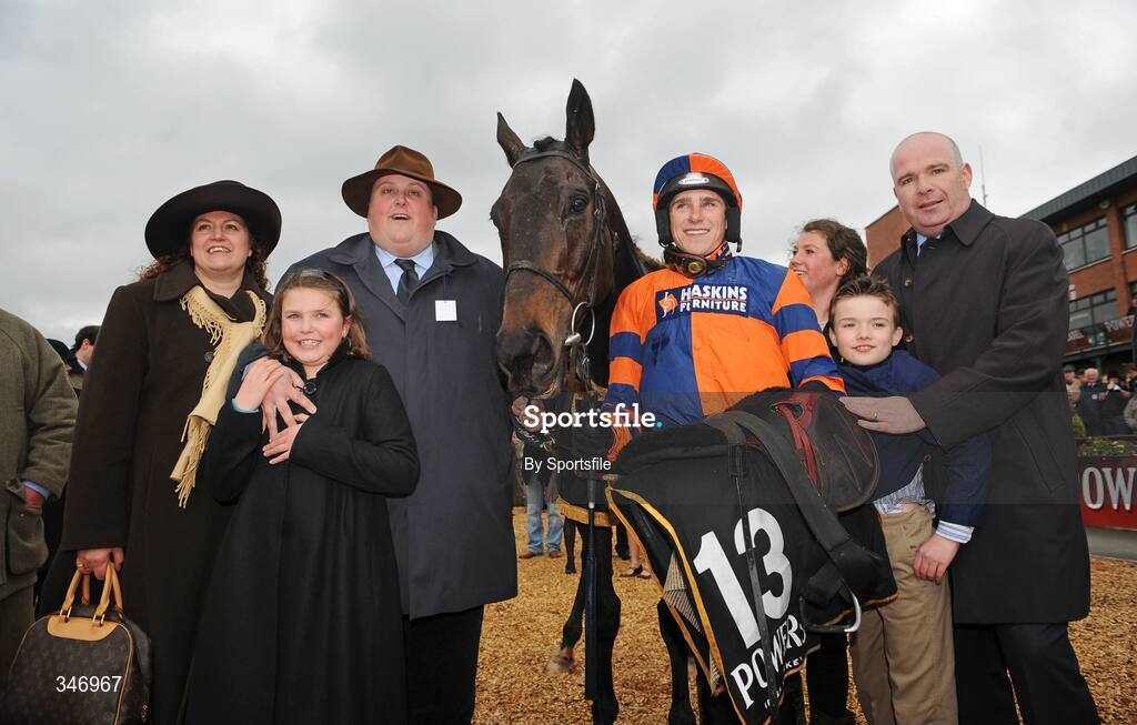 13 April 2009; The winning connections of Niche Market, including owner Graham Regan, left, and jockey Harry Skelton, after winning the Powers Whiskey Irish Grand National Steeplechase. Fairyhouse Racecourse, Co. Meath. Photo by Sportsfile