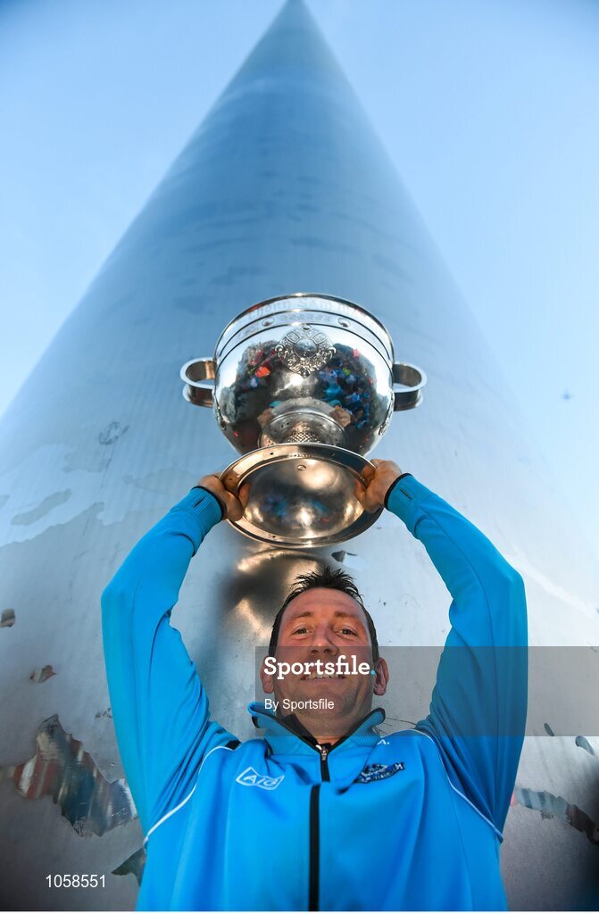 21 September 2015; Dublin's Denis Bastick holds the Sam Maguire cup aloft under the Spire of Dublin during the team homecoming. O'Connell St, Dublin. Photo by Sportsfile