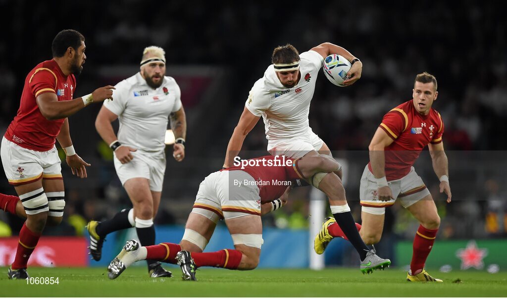 26 September 2015; Tom Wood, England, is tackled by Dan Lydiate, Wales. 2015 Rugby World Cup, Pool A, England v Wales, Twickenham Stadium, London, England. Picture credit: Brendan Moran / SPORTSFILE