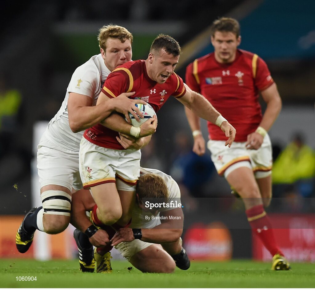 26 September 2015; Gareth Davies, Wales, is tackled by Joe Launchbury, England. 2015 Rugby World Cup, Pool A, England v Wales, Twickenham Stadium, London, England. Picture credit: Brendan Moran / SPORTSFILE