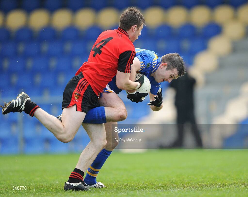 25 April 2009; Luke Howard, Down, takes down Barry Grogan, Tipperary, to concede a penalty. Allianz GAA National Football League, Division 3 Final, Down v Tipperary, Pearse Park, Longford. Picture credit: Ray McManus / SPORTSFILE