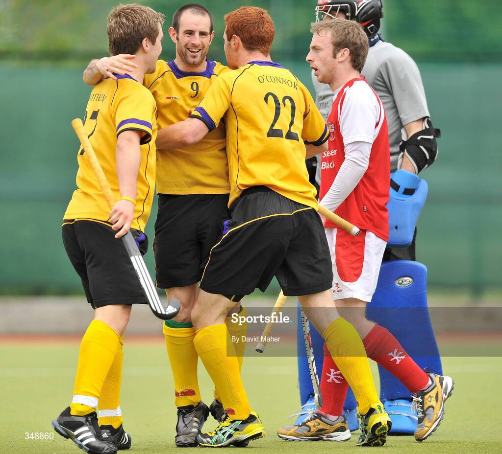 26 April 2009; Maurice Elliott, no.9, Pembroke Wanderers, celebrates after scoring his side's second goal with team-mates Alan Sothern, left and Michael O'Connor. Irish Senior Men's Cup Final, Cookstown v Pembroke Wanderers, National Hockey Stadium, UCD, Dublin. Picture credit: David Maher / SPORTSFILE
