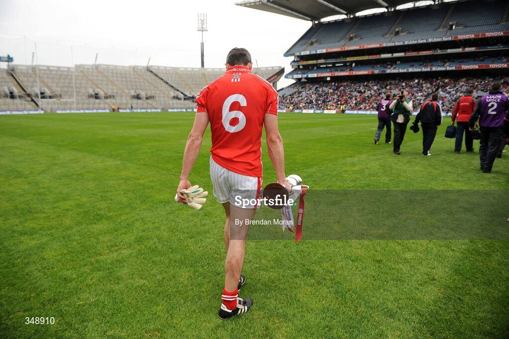 26 April 2009; Cork captain Graham Canty leaves the pitch with the Diviion 2 trophy after the game. Allianz GAA National Football League, Division 2 Final, Cork v Monaghan, Croke Park, Dublin. Picture credit: Brendan Moran / SPORTSFILE