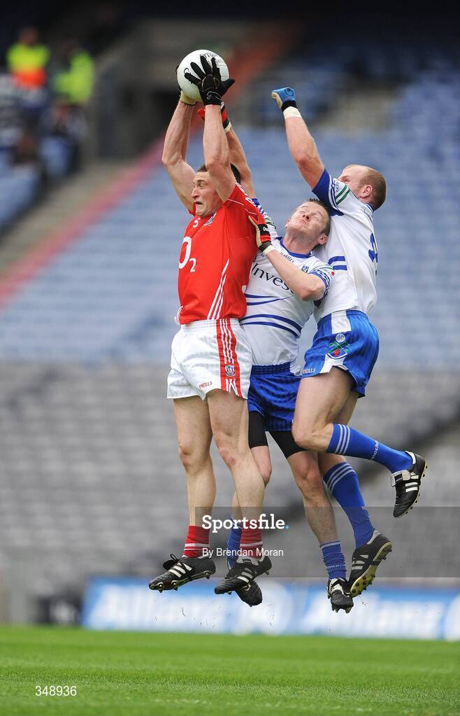 26 April 2009; Noel O'Leary, Cork, fields a high ball ahead of Mark Downey, centre, and Dick Clerkin, Monaghan. Allianz GAA National Football League, Division 2 Final, Cork v Monaghan, Croke Park, Dublin. Picture credit: Brendan Moran / SPORTSFILE