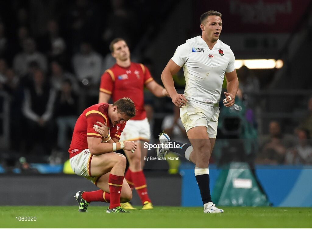 26 September 2015; Hallam Amos, Wales, pulls up with an injury before leaving the pitch. 2015 Rugby World Cup, Pool A, England v Wales, Twickenham Stadium, London, England. Picture credit: Brendan Moran / SPORTSFILE