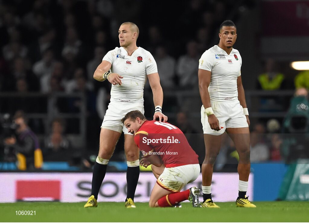 26 September 2015; Mike Brown, England, signals for attention for the injured Hallam Amos, Wales. 2015 Rugby World Cup, Pool A, England v Wales, Twickenham Stadium, London, England. Picture credit: Brendan Moran / SPORTSFILE