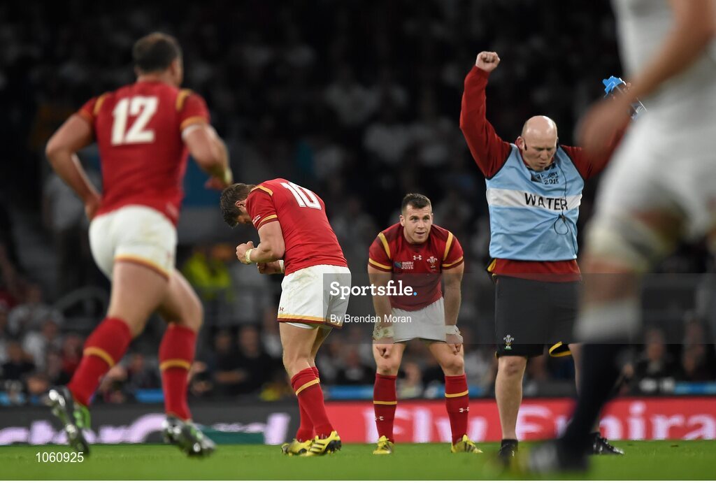 26 September 2015; Dan Biggar, Wales, and kicking coach Neil Jenkins celebrate the last penalty to win the game. 2015 Rugby World Cup, Pool A, England v Wales, Twickenham Stadium, London, England. Picture credit: Brendan Moran / SPORTSFILE