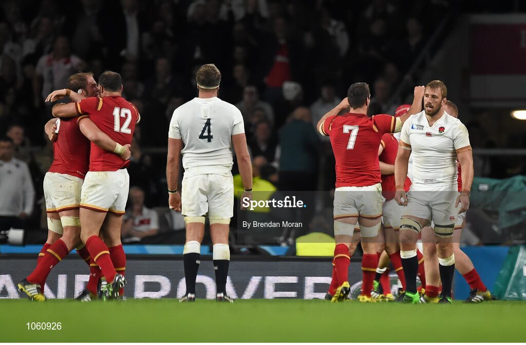 26 September 2015; England captain Chris Robshaw, right, looks on as Wales celebrate at the final whistle. 2015 Rugby World Cup, Pool A, England v Wales, Twickenham Stadium, London, England. Picture credit: Brendan Moran / SPORTSFILE