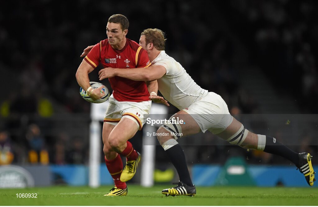 26 September 2015; George North, Wales, loses possession as he is tackled by Joe Launchbury, England. 2015 Rugby World Cup, Pool A, England v Wales, Twickenham Stadium, London, England. Picture credit: Brendan Moran / SPORTSFILE