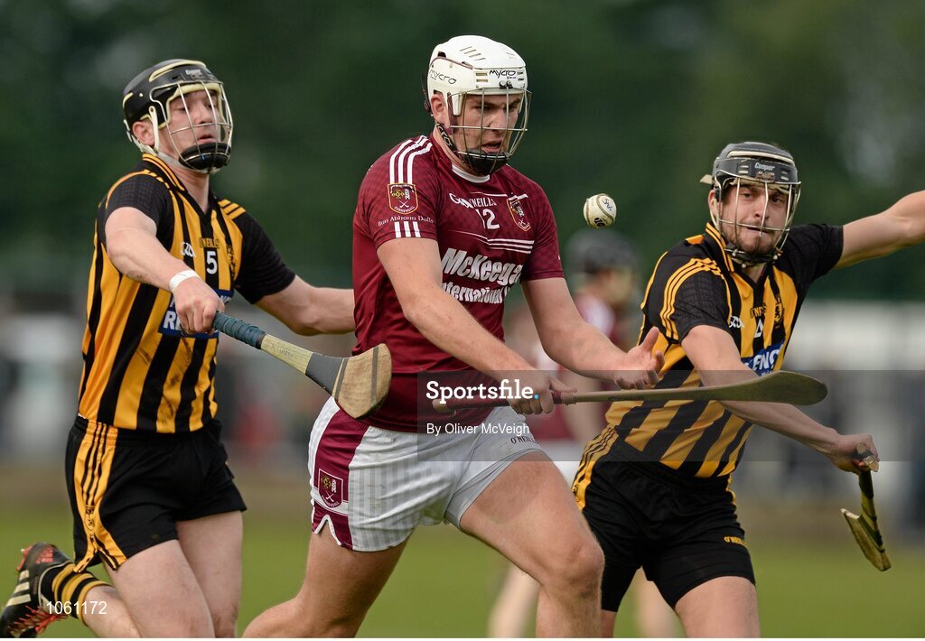 27 September 2015; Conor Carson, Ruairi Og Cushendall, in action against James McShane and Dermott Donnelly, Ballycastle McQuillan. Antrim Senior Championship Hurling Final, Ruairi Og Cushendall v Ballycastle McQuillan, Dunloy GAA Club, Dunloy, Co. Antrim. Picture credit: Oliver McVeigh / SPORTSFILE