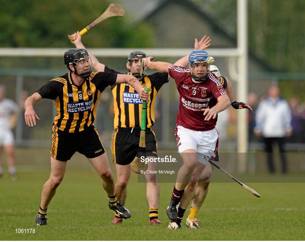 27 September 2015; Paddy McGill, Ruairi Og Cushendall, in action against Fergus Donnelly and Ciaran Clarke, Ballycastle McQuillan. Antrim Senior Championship Hurling Final, Ruairi Og Cushendall v Ballycastle McQuillan, Dunloy GAA Club, Dunloy, Co. Antrim. Picture credit: Oliver McVeigh / SPORTSFILE