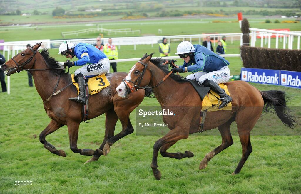 1 May 2009; Equus Maximus, No 3, with Ruby Walsh up, on their way to winning the Betfair Novice Handicap Steeplechase from second place Tranquil Sea with Andrew McNamara after jumping the last. 2009 Punchestown Irish National Hunt Festival, Punchestown Racecourse, Co. Kildare. Picture credit: Matt Browne / SPORTSFILE