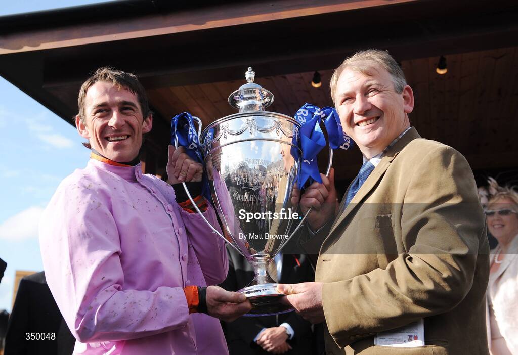 1 May 2009; Davy Russell and trainer Charles Byrnes after winning the Rabobank Champion Hurdle with Solwhit. 2009 Punchestown Irish National Hunt Festival, Punchestown Racecourse, Co. Kildare. Picture credit: Matt Browne / SPORTSFILE