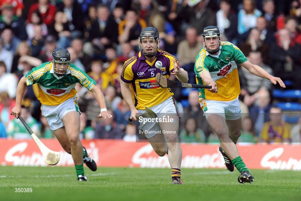3 May 2009; Michael Jacob, Wexford, in action against Daniel Currams, left, and Derek Molloy, Offaly. Allianz GAA NHL Division 2 Final, Wexford v Offaly, Semple Stadium, Thurles, Co. Tipperary. Picture credit: Diarmuid Greene / SPORTSFILE