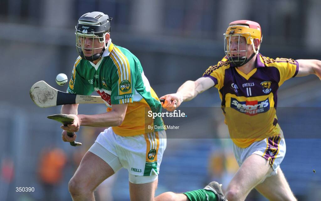 3 May 2009; Derek Molloy, Offaly, in action against Andrew Shore, Wexford. Allianz GAA NHL Division 2 Final, Wexford v Offaly, Semple Stadium, Thurles, Co. Tipperary. Picture credit: David Maher / SPORTSFILE