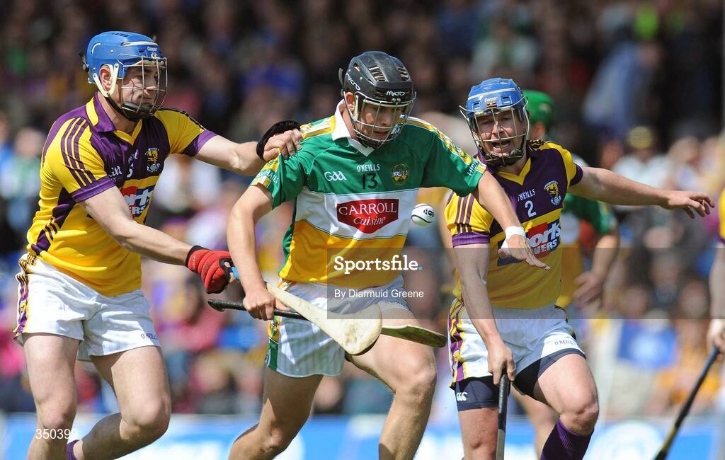 3 May 2009; Daniel Currams, Offaly, in action against Stephen Nolan, left, and Malachy Travers, Wexford. Allianz GAA NHL Division 2 Final, Wexford v Offaly, Semple Stadium, Thurles, Co. Tipperary. Picture credit: Diarmuid Greene / SPORTSFILE
